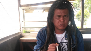 Bromo Ginting Ketua PAC IPK Berastagi, saat mengungkapkan kekesalannya terhadap petugas KPPS Rabu 27 Jun 2018