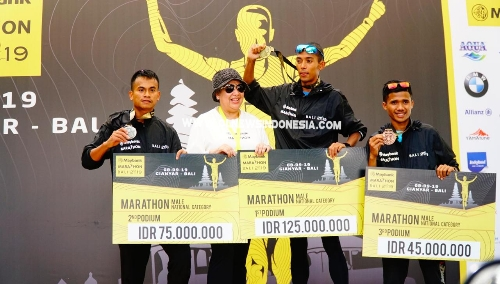 Ket foto : Pratu Wilman Pasaribu personil 121/Mk Brigif 7 /Rimba Raya, Kodam I/BB meraih Perak saat ikuti ajang Internasional lomba Maybank Marathon tahun 2019 di Bali (Ist- dok).